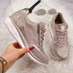 Women's low-top sneakers with laces, side zippers, metallic panels and white soles