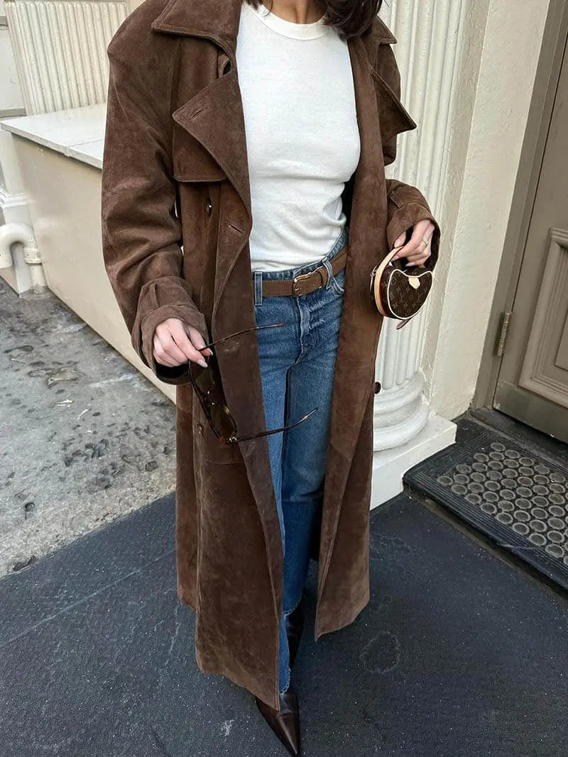 Women's brown long trench coat with contrast lapels and belted waist