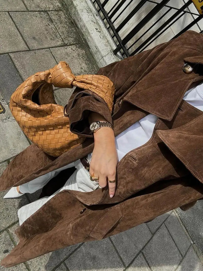 Women's brown long trench coat with contrast lapels and belted waist