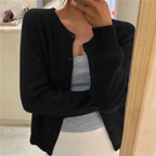 Women's waist-length knit cardigan with round neck and button front