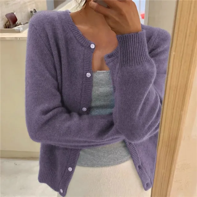 Women's waist-length knit cardigan with round neck and button front