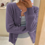 Women's waist-length knit cardigan with round neck and button front