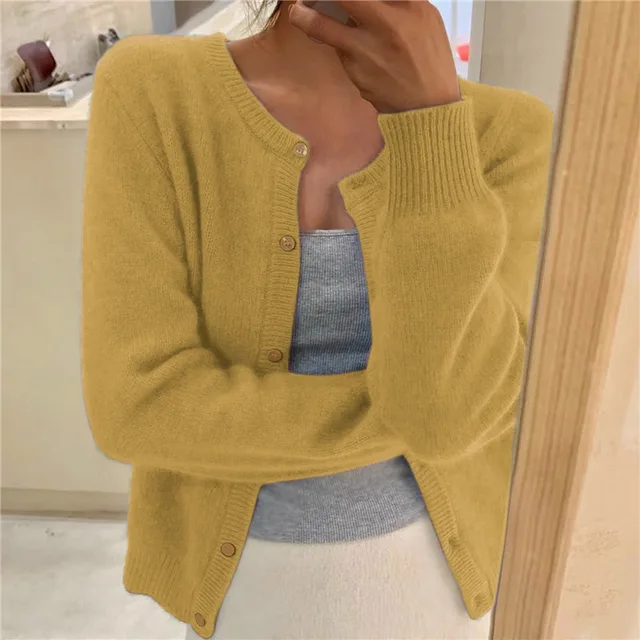 Women's waist-length knit cardigan with round neck and button front