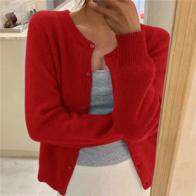 Women's waist-length knit cardigan with round neck and button front