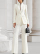 Women's two-piece suit with high-collar blazer and wide leg trousers