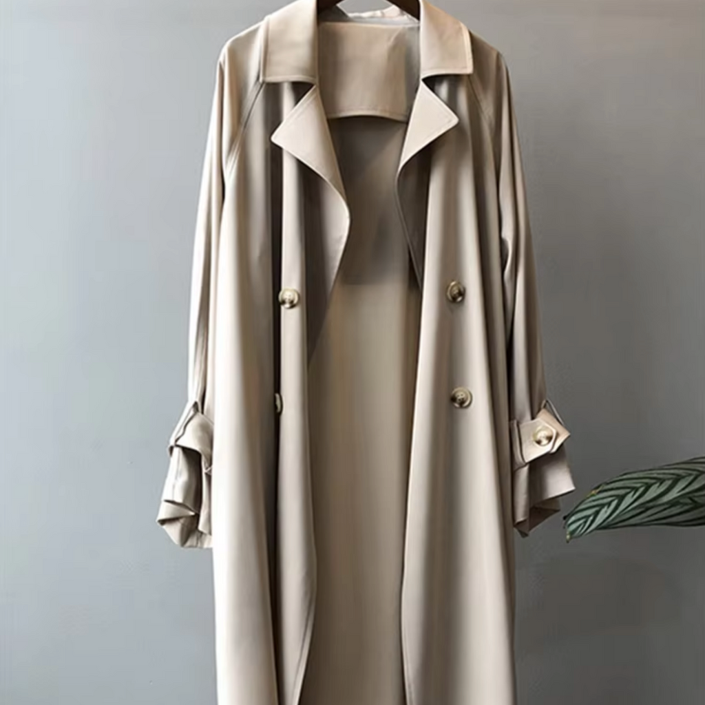 Women's long double breasted trench coat with lapel collar and cuff straps