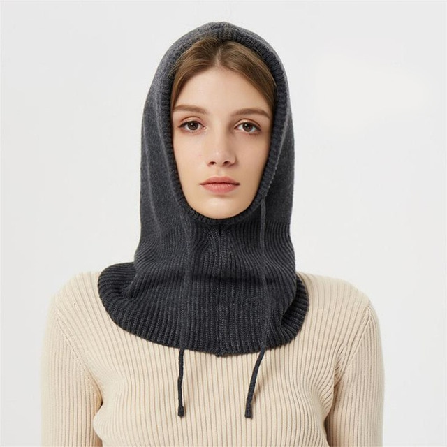 Knitted hooded winter hat with ribbed neck cover and front ties