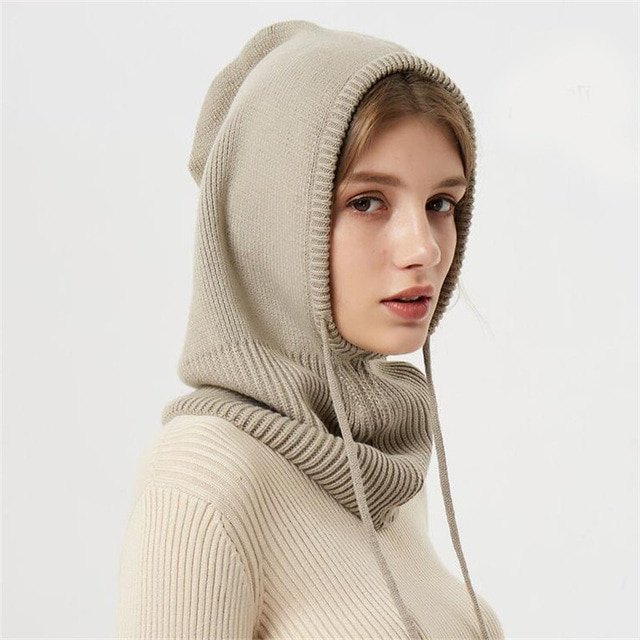 Knitted hooded winter hat with ribbed neck cover and front ties
