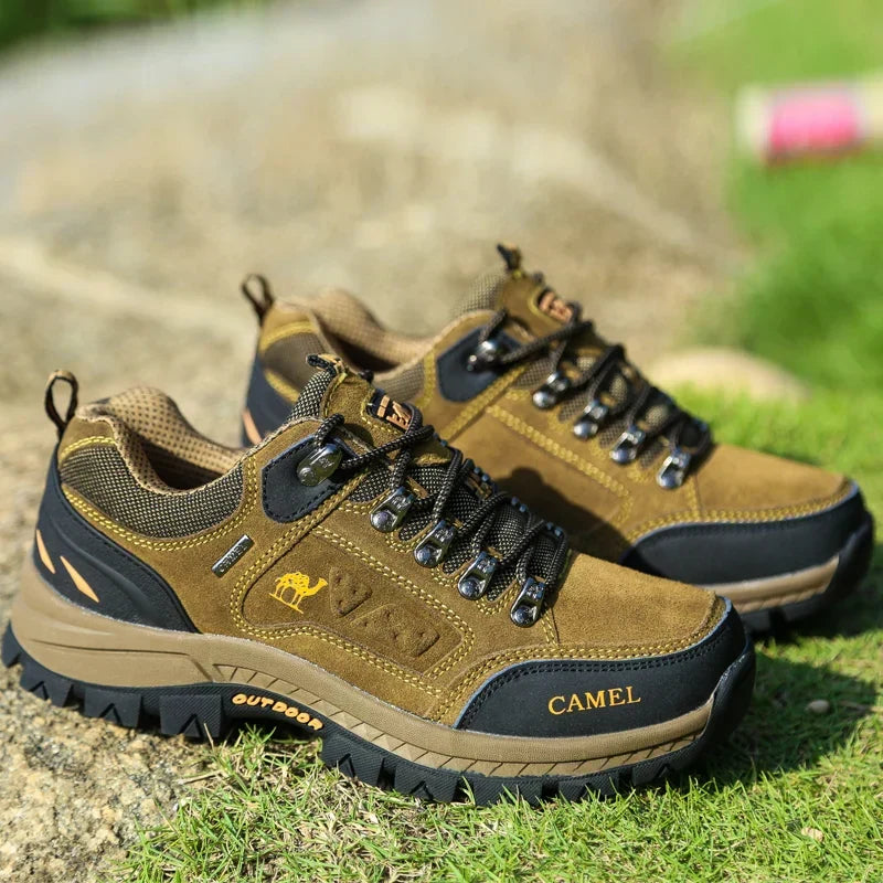 Lace-up hiking shoe with layered panels and chunky tread sole