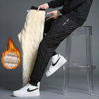 Women's quilted jogger trousers with drawstring waist, zipped pockets and ribbed ankle cuffs