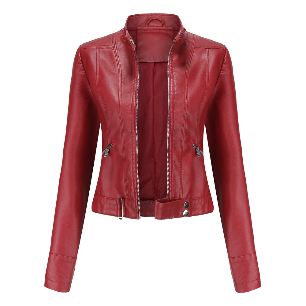 Women's fitted faux leather biker jacket with stand collar, long sleeves and zipped pockets