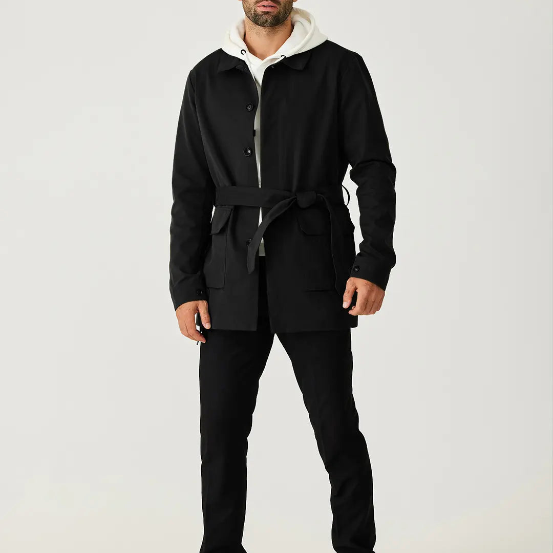 Men's black short trench coat with button front and flap pockets