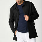 Men's black short trench coat with button front and flap pockets