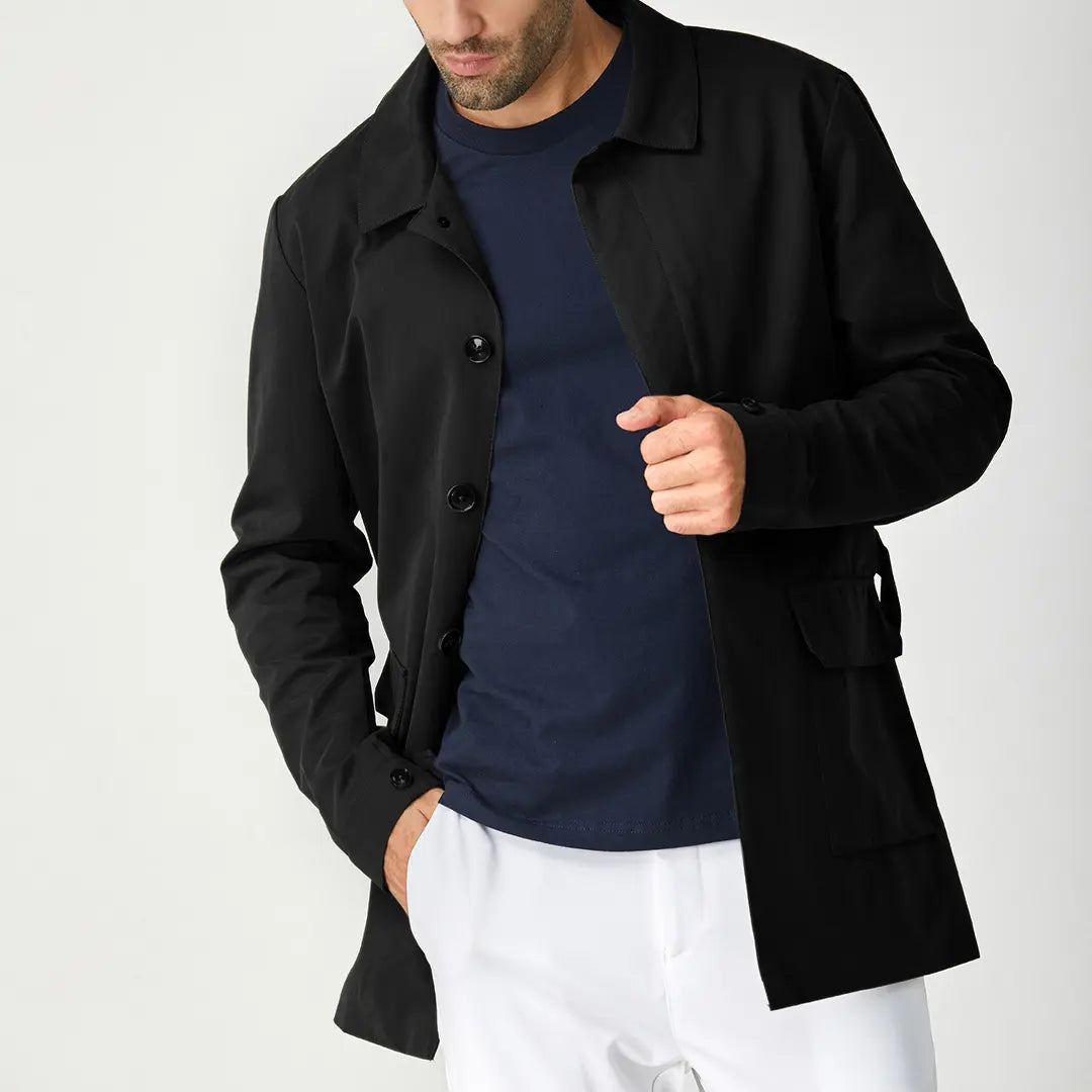 Men's black short trench coat with button front and flap pockets
