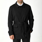 Men's black short trench coat with button front and flap pockets