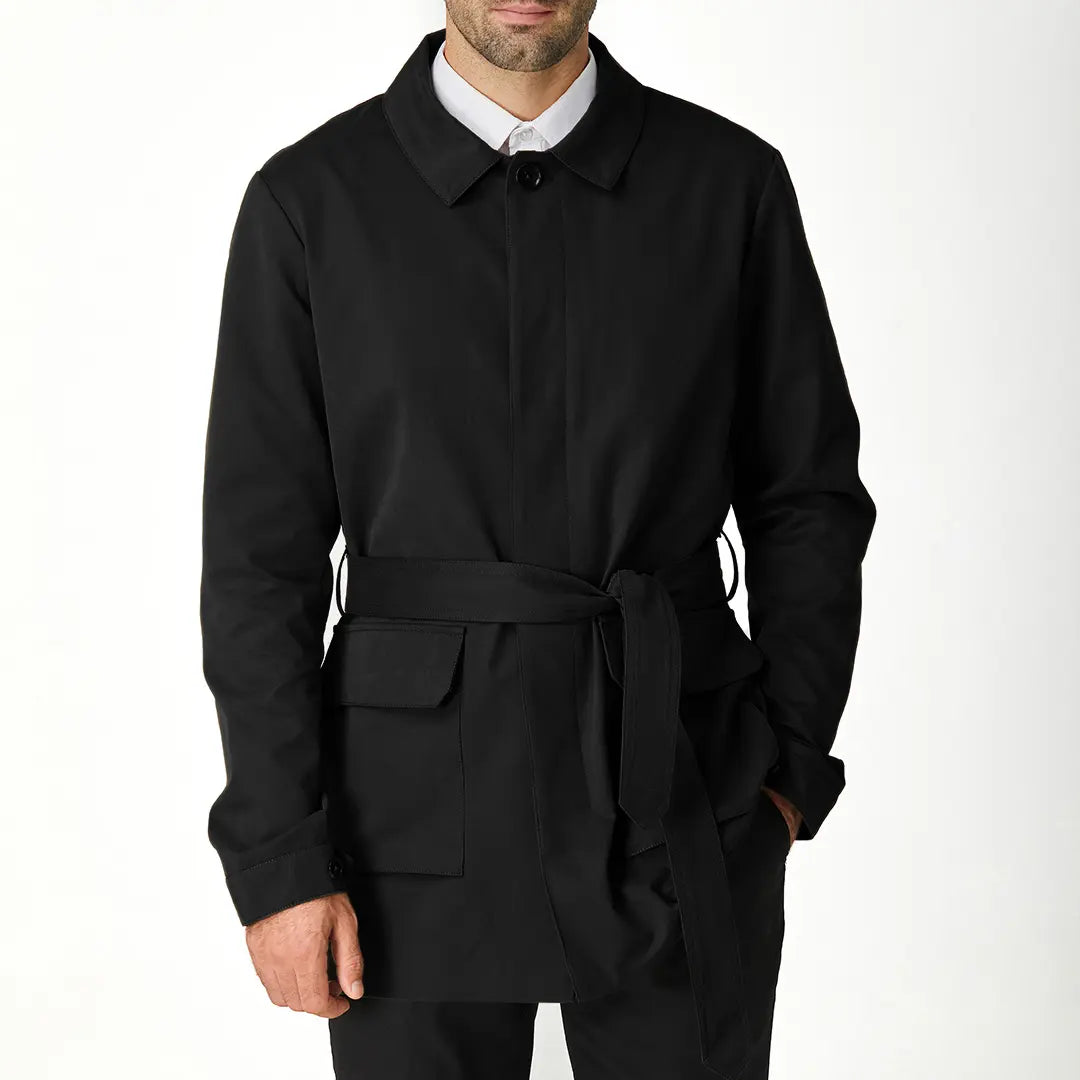 Men's black short trench coat with button front and flap pockets