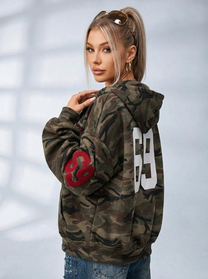 Women's olive camouflage hoodie with zip front, hood and graphic details