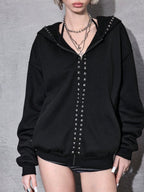 Black oversized hooded hoodie with full zip fastening, stud details and zipped pockets