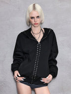 Black oversized hooded hoodie with full zip fastening, stud details and zipped pockets