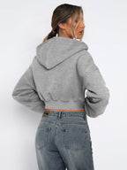 Women's cropped hooded sweatshirt with long sleeves and full front zip