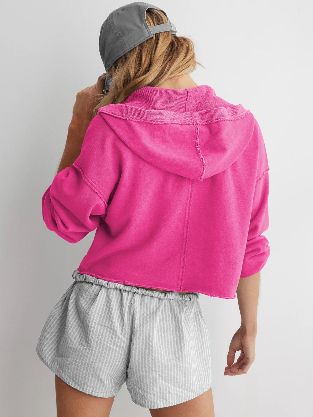 Women's relaxed hooded half-zip hoodie with long sleeves and ribbed trims