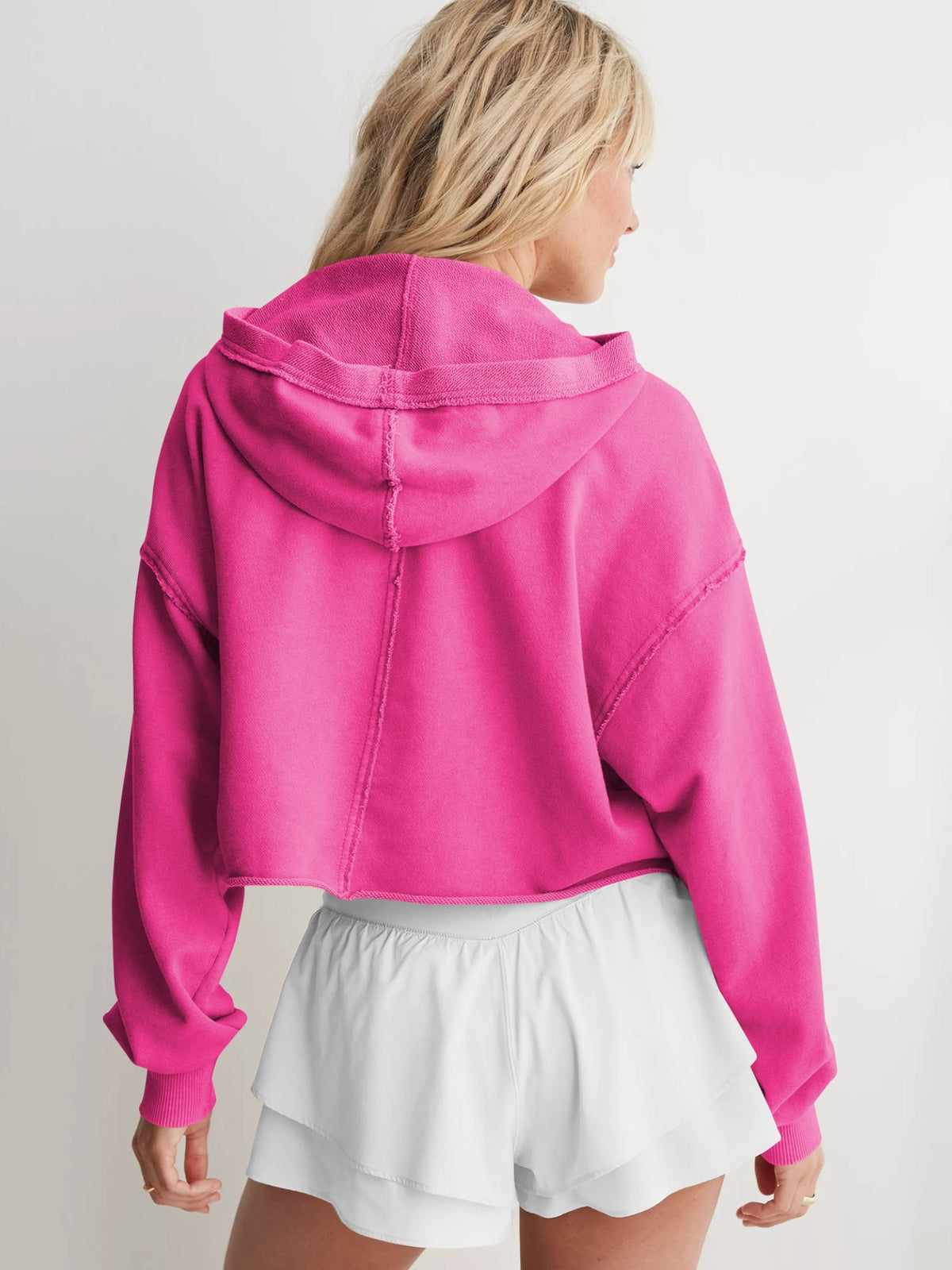 Women's relaxed hooded half-zip hoodie with long sleeves and ribbed trims