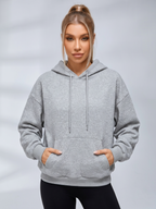Women's cropped embossed hoodie with drawstring hood and wing back detail