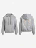 Women's cropped embossed hoodie with drawstring hood and wing back detail