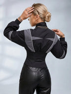 Women's black colour block jacket with grey panels, mock neck and cinched waist