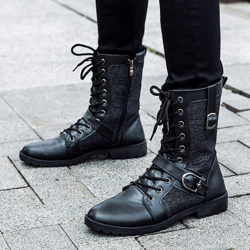 Men's black combat boots with lace-up front and buckle straps