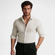 Men's striped button-up shirt with point collar and rolled sleeves