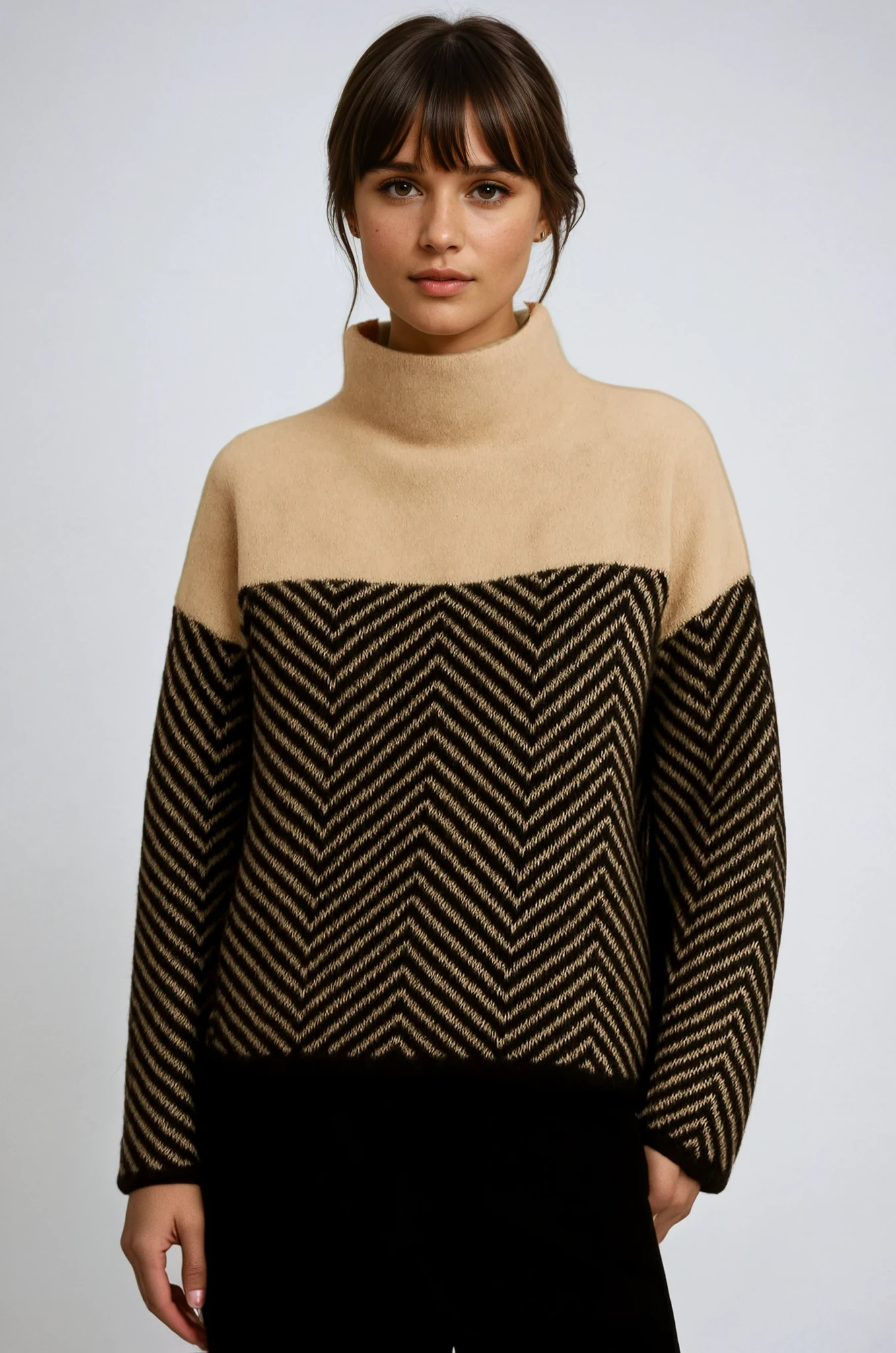 Women's chevron turtleneck sweater with contrasting patterned sleeves