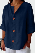Women's button front blouse with V-neckline and short sleeves