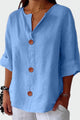 Women's button front blouse with V-neckline and short sleeves