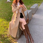 Women's long belted trench coat with wide collar and double-breasted front