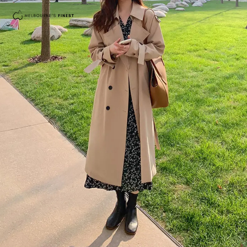 Women's long belted trench coat with wide collar and double-breasted front
