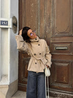 Women's belted trench jacket with high collar and button front