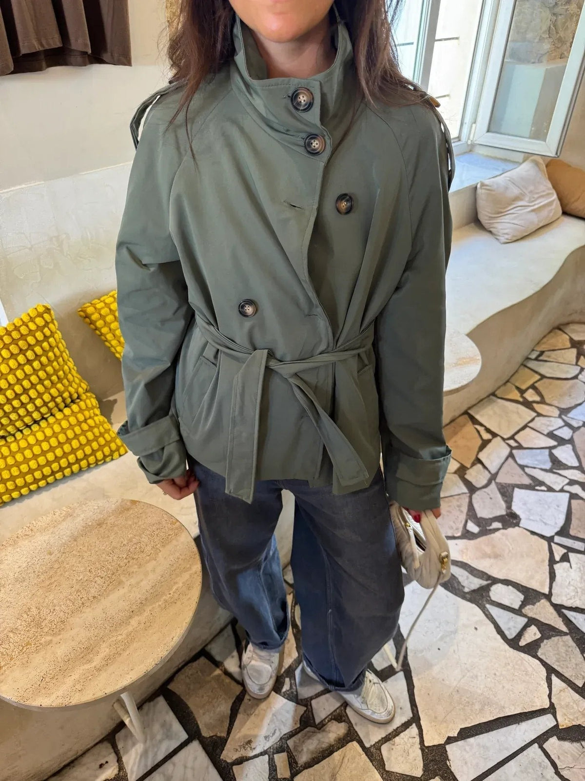 Women's belted trench jacket with high collar and button front