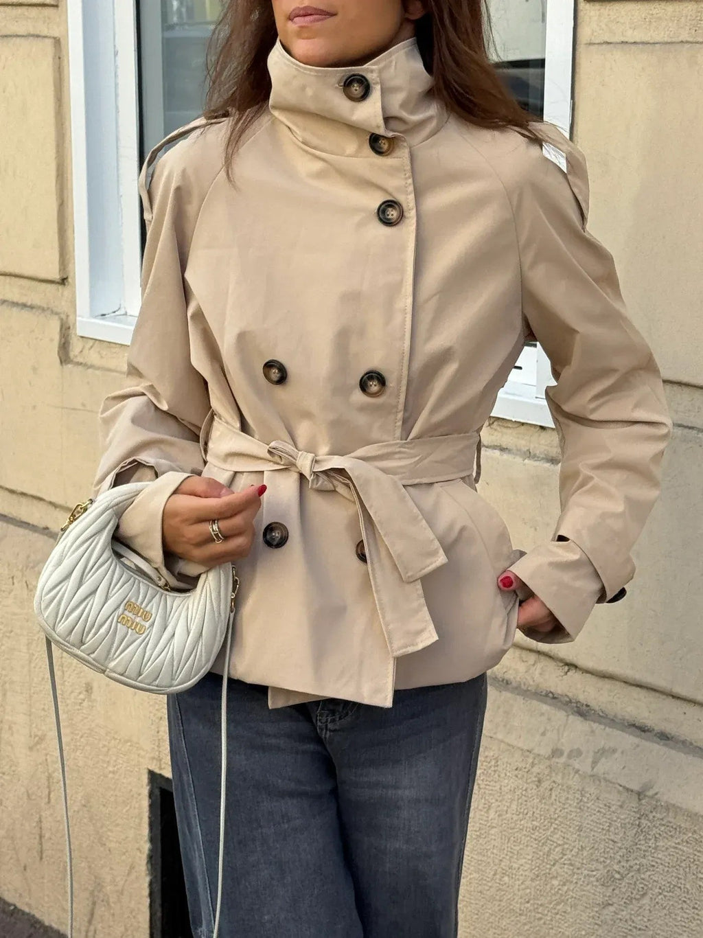 Women's belted trench jacket with high collar and button front