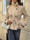 Women's belted trench jacket with high collar and button front