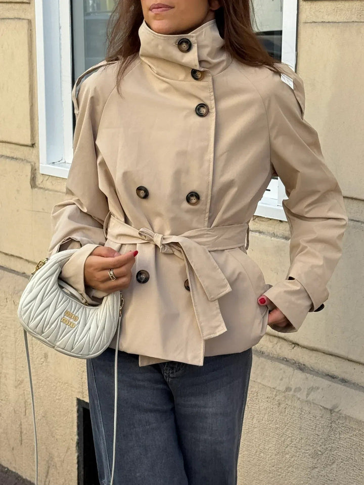 Women's belted trench jacket with high collar and button front