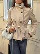 Women's belted trench jacket with high collar and button front