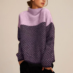 Women's chevron turtleneck sweater with contrasting patterned sleeves