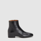 Black women's ankle boot with round toe and side zipper
