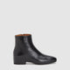 Black women's ankle boot with round toe and side zipper