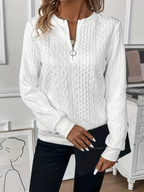 Women's cable knit half-zip sweater with long sleeves