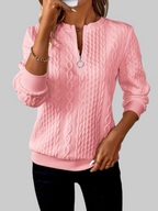 Women's cable knit half-zip sweater with long sleeves