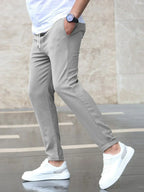Men's slim fit jogger pants with drawstring waist and tapered cuff in grey