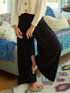 Women's black wide-leg palazzo pants with elastic waist