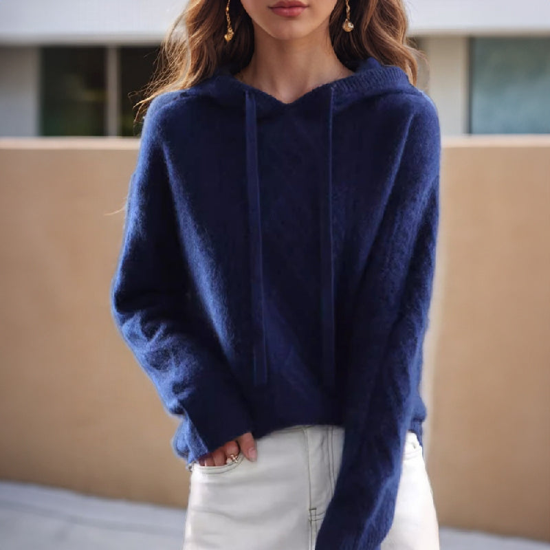 Women's cable knit hooded sweater with drawstrings and long sleeves